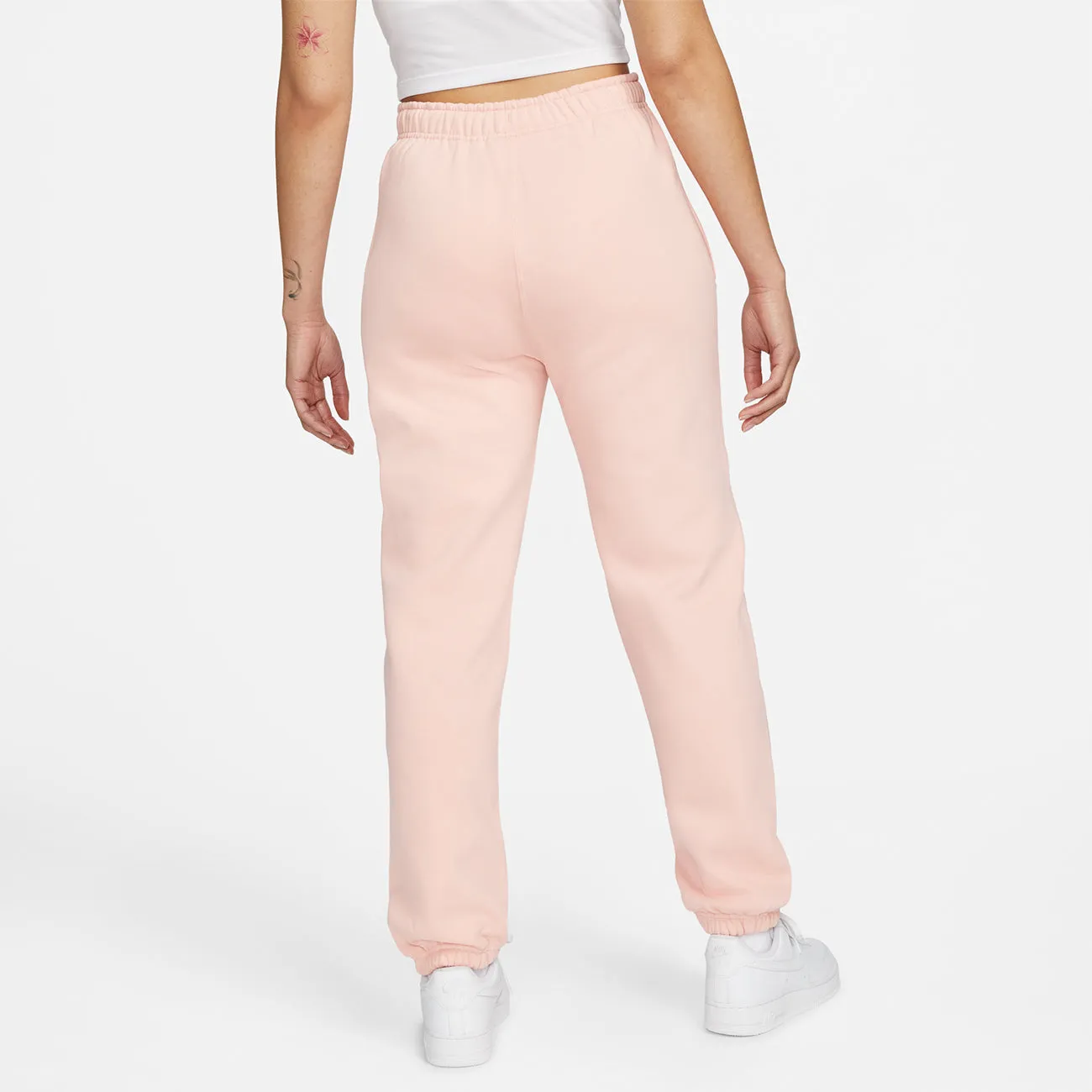 W SOLOSWOOSH FLEECE PANT BLEACHED CORAL WHITE